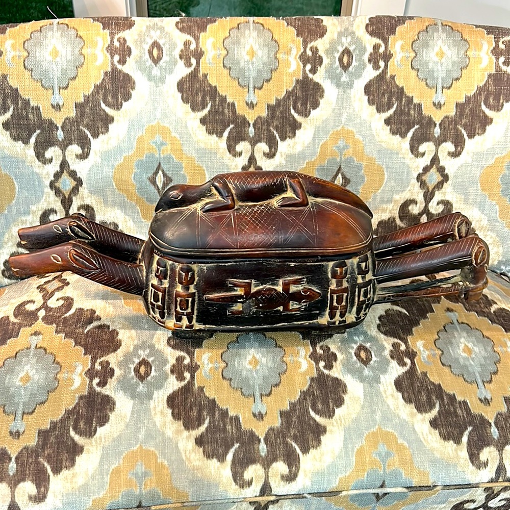 Hand carved ornate wooden art piece.